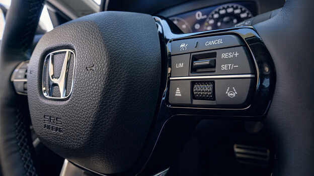 Close up of the steering wheel safety features. 